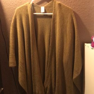 A brown wrap, never used. Has no tags